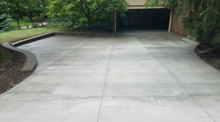 concrete driveway installation in Highland, MI